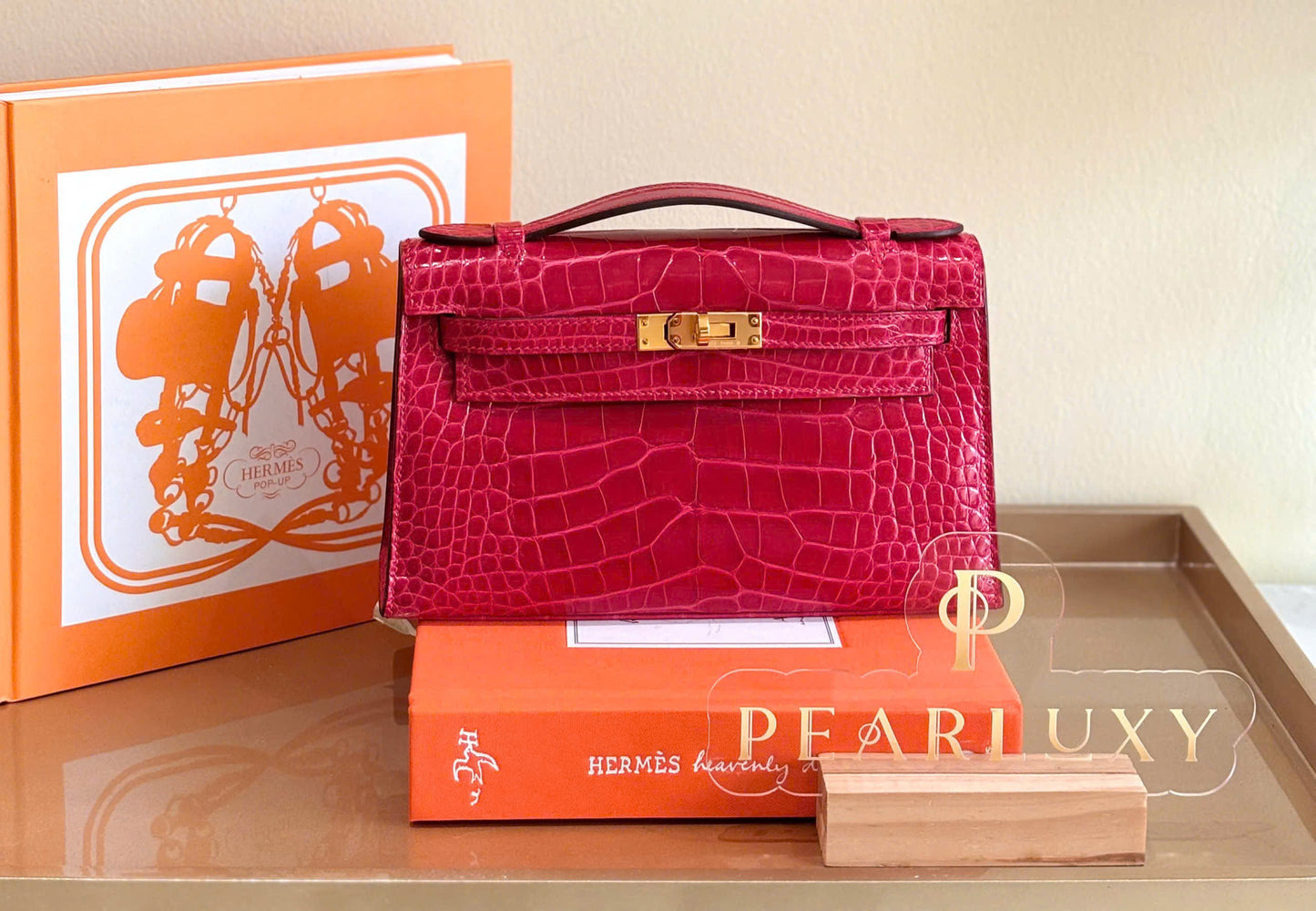 Kelly pochette Alligator GHW - Braise